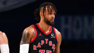 比賽期間身穿Raptors球衣並有刺青的職業籃球運動員。 — 籃球 壁紙