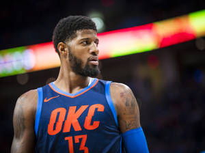 比賽中身穿OKC球衣並有刺青的籃球運動員 — 保羅·喬治 壁紙