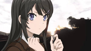 動漫女孩在夕陽下拿著耳機，樹木剪影。 — 櫻島麻衣 壁紙