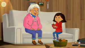 祖母和孫女在舒適的客廳沙發上微笑。 — Pbs Kids 壁紙