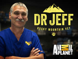 獸醫Dr Jeff穿著藍色手術服，雙臂交叉，帶有Animal Planet和Rocky Mountain Vet品牌標誌。 — 野生動物 壁紙