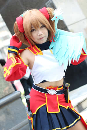 穿著紅藍色動漫服裝的cosplayer，肩上有一隻藍色小鳥 — POCO Pad 壁紙