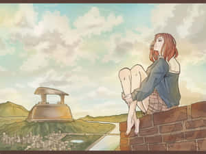 一個紅髮女孩坐在磚牆上，俯瞰著城市和金色紀念碑。 — 櫻島麻衣 壁紙