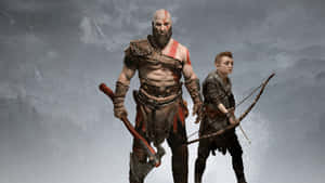 《God of War》主角克雷多斯與其子阿特柔斯身處雪覆蓋的山區環境。 — 戰神 壁紙
