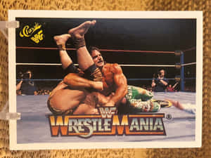 摔角手在WrestleMania活動期間在摔角場內執行腿部鎖定動作。 — 運動 壁紙