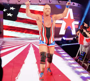 摔角手身穿愛國裝備在星光閃耀的入口坡道上慶祝勝利。 — WWE GIF 壁紙