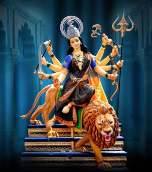 多臂印度教女神騎著獅子手持武器 — Maa Durga 壁紙