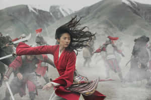 一位紅衣女戰士在山地戰場上與士兵戰鬥。 — MacBook Air M4 壁紙