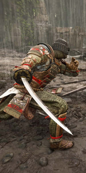 身穿雨濕鎧甲的武士蹲在石頭廢墟中手持武士刀。 — 電玩遊戲 GIF 壁紙