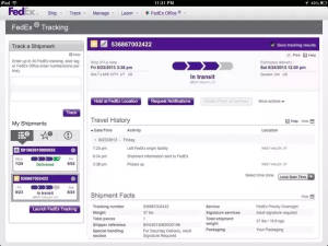 FedEx 貨件追蹤畫面，顯示包裹狀態和旅程歷史。 — Vans 標誌 壁紙