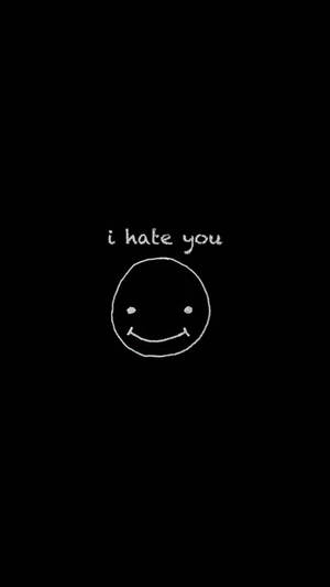 在黑色背景上，用白色粉筆畫出一個笑臉，上方有 i hate you 字樣。 — 簡約 壁紙