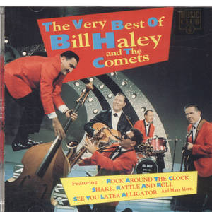 Bill Haley and The Comets 穿著紅色西裝在閃爍的舞台上表演搖滾樂。 — 復古 壁紙