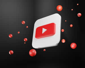 深色背景上帶有漂浮紅色球體的YouTube標誌圖示 — 5:4 壁紙
