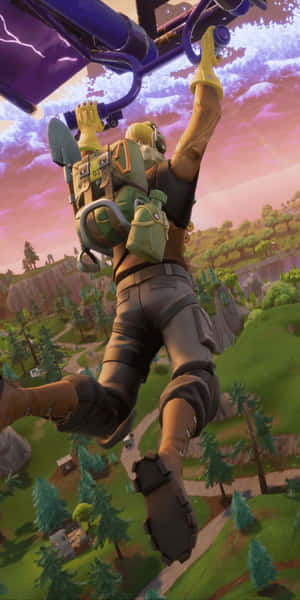 Fortnite角色在日落時分掛在滑翔機上，下方是綠色景觀 — 電玩遊戲 GIF 壁紙