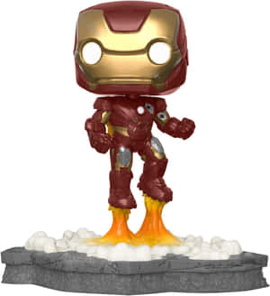 鋼鐵人Funko Pop人偶，靴子噴出火焰，站在岩石底座上。 — 鋼鐵人標誌 壁紙