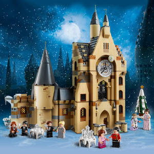 LEGO哈利波特城堡，迷你人偶在雪夜天空下慶祝。 — iPhone X 動態 壁紙