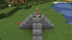 水邊Minecraft草地上的石頭紀念碑，帶有木柱和斷劍。 — 可愛的牛 壁紙