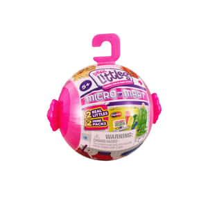 帶有警告標籤的Real Littles Micro Mart粉紅色球形玩具包裝。 — 仙女美學 壁紙