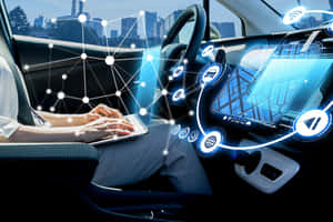 在智能汽車中使用平板電腦的人，帶有發光的數字界面。 — 弗萊克斯·惠勒 壁紙