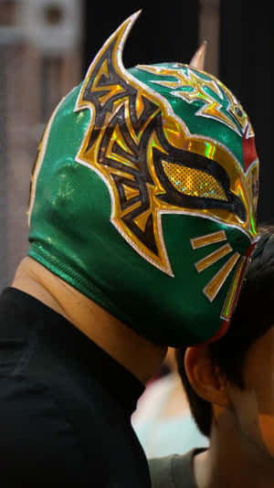 特寫一名摔角手戴著綠色和金色的 lucha libre 面具。 — 摔角 壁紙