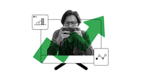 玩掌上型遊戲的人，周圍有綠色成長箭頭和數據圖表。 — 酷炫遊戲 壁紙