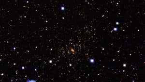 廣闊的星星和星系在黑暗的夜空中閃耀。 — 星星 壁紙