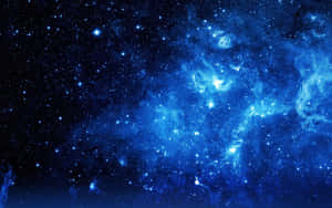 廣闊的藍色星雲，充滿了在深空中閃爍的星星。 — 藍色銀河 壁紙