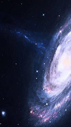 一個在深空中帶有發光星星和宇宙塵埃的螺旋星系。 — 深色霓虹 iPhone 壁紙