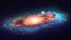 螺旋星系，具有發光的核心和充滿恆星和宇宙塵埃的旋轉臂。 — 藍色銀河 壁紙