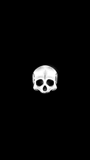 一個白色點畫骷髏頭居中於黑色背景上。 — 死亡筆記本 GIF 壁紙
