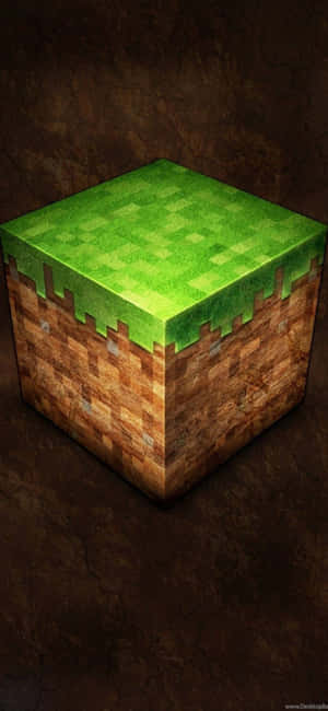 一個在深色紋理表面上的Minecraft像素化草地塊。 — Galaxy Note 壁紙