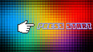 像素化手型游標指向彩虹網格上的「press start」文字。 — 酷炫太空 壁紙