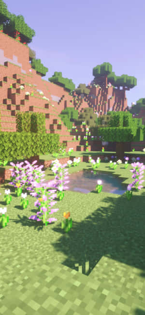 一個Minecraft場景，在方塊狀的景觀中有池塘和花朵。 — 電玩遊戲 GIF 壁紙