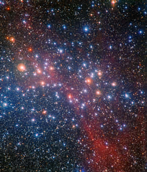 深空中密集的恆星和色彩繽紛的星雲。 — 星星 壁紙