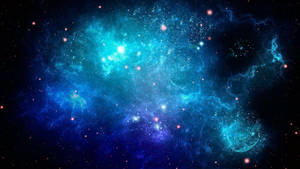 一個在深空中充滿星星的發光藍色和藍綠色星雲。 — 星星 壁紙