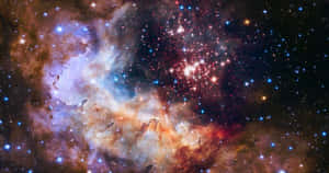 充滿活力的宇宙星雲，在深空中帶有發光的雲團和星星。 — 宇宙 壁紙