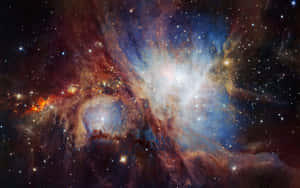 一個色彩繽紛的星雲，在深空中有發光的雲層和明亮的星星。 — 宇宙 壁紙