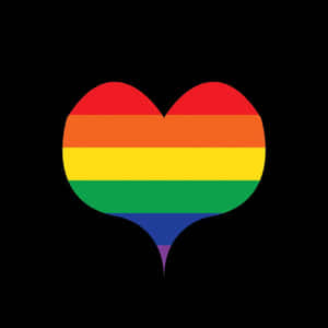 一個彩虹色的心形標誌，在黑色背景上代表 LGBTQ 驕傲。 — 藍色愛心 壁紙
