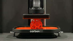 一個由Carbon 3D打印機創建的紅色3D打印網格球體。 — 3D 壁紙