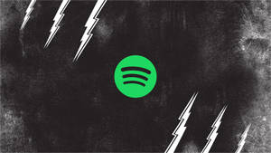 帶有白色閃電的Spotify標誌，位於帶有紋理的黑色背景上。 — Spotify 壁紙