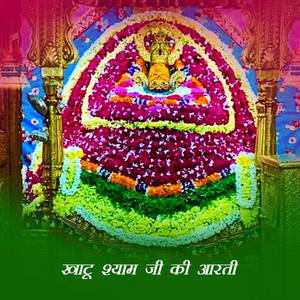 寺廟中神像周圍色彩繽紛的花卉佈置 — Maa Durga 壁紙