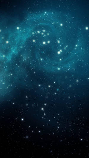 在黑暗的宇宙天空中，一個帶有發光恆星的青綠色星雲。