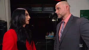 兩個摔角手在WWE活動後台對峙。 — WWE GIF 壁紙