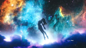 一個女人的剪影漂浮在充滿星星的多彩宇宙星雲中。 — 靈魂 壁紙