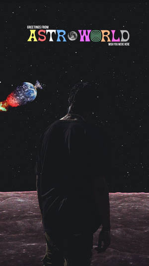 月球上一個人的剪影，看著星空中的彩色行星和Astro World文字。 — 崔維斯·史考特 天文世界 壁紙