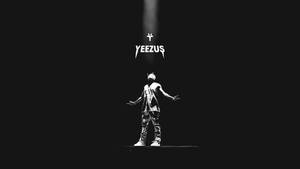 舞台上聚光燈下的表演者，上方有「YEEZUS」文字。 — 肯伊·威斯特 壁紙