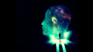 一個人走向一個包含彩色星雲的發光頭部。 — 靈性動圖 壁紙