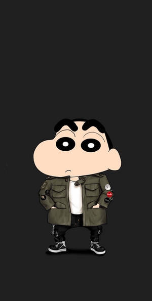 卡通男孩穿著綠色外套，雙手插在口袋裡，站在深色背景前。 — Marshmello iPhone 壁紙