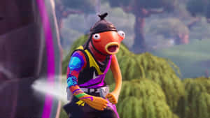 一個穿著色彩繽紛服裝的驚訝卡通魚角色站在戶外。 — 魚棒 Fortnite 壁紙