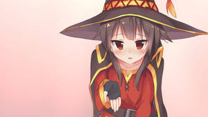 動漫女巫穿著紅黑服裝，戴著寬邊帽，背景為粉紅色。 — 惠惠 壁紙